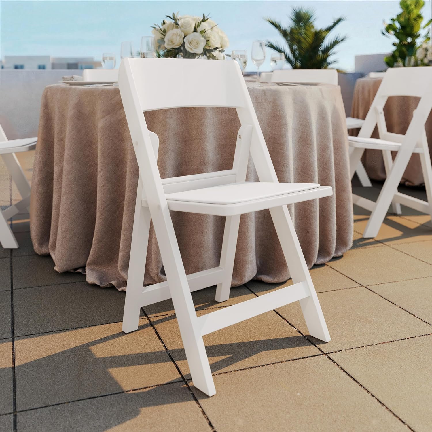White Padded Resin Folding Chairs